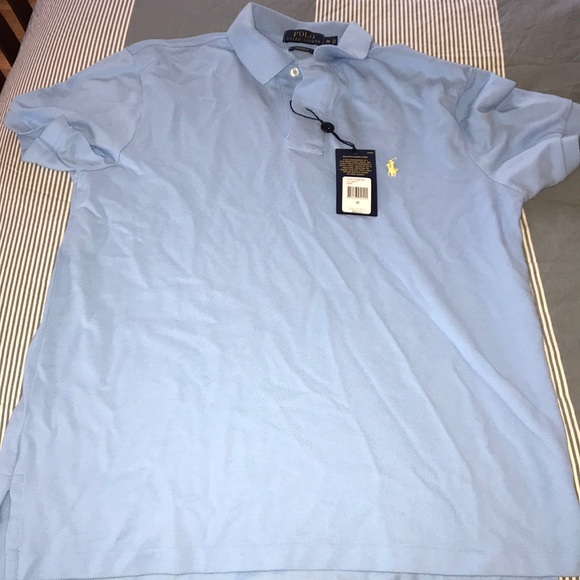 white polo shirt with light blue horse